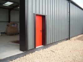 G15 steel doors in industrial building - contrasting colours